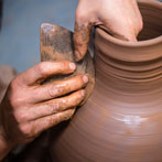 Doug Fitch and Hannah McAndrew making a jug for me